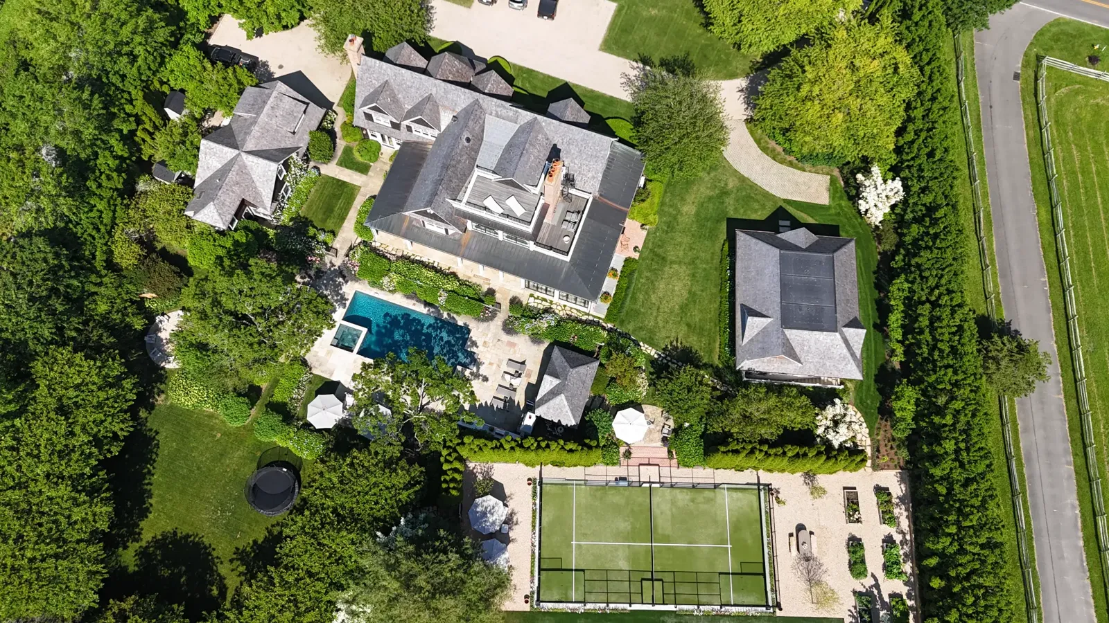 Aerial view of a padel court on a private New England estate